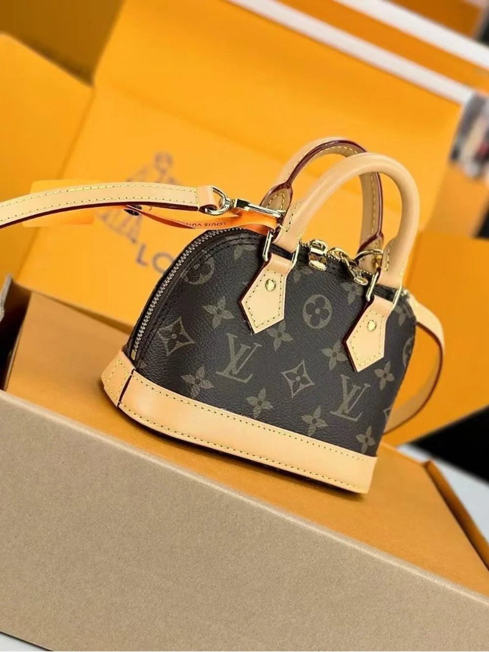 Louis Vuttion Brown Monogram Mini Handbag with Tan Trim